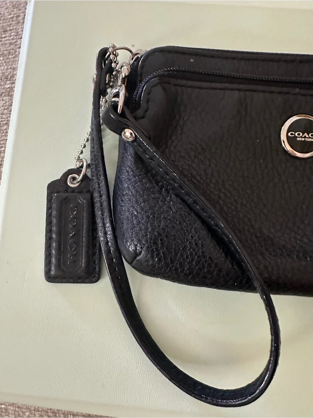 COACH Black Pebbled Leather Double Zipper Wristlet, Logo Disc, Ice Blue Lining